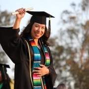 Female graduate with diploma