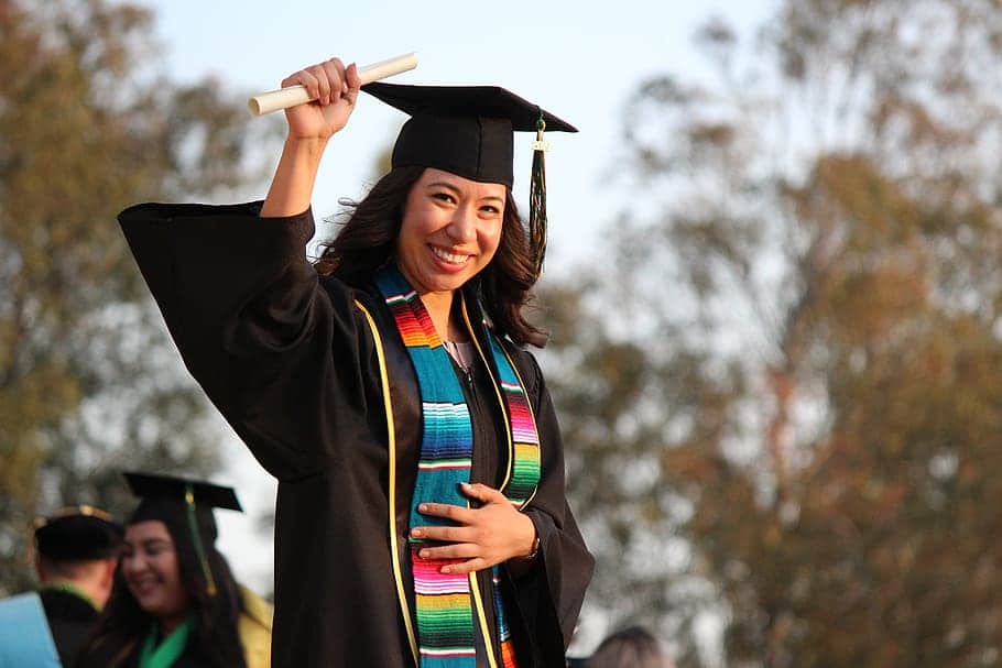 Female graduate with diploma