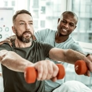 Physical Therapist Assistant with a male patient