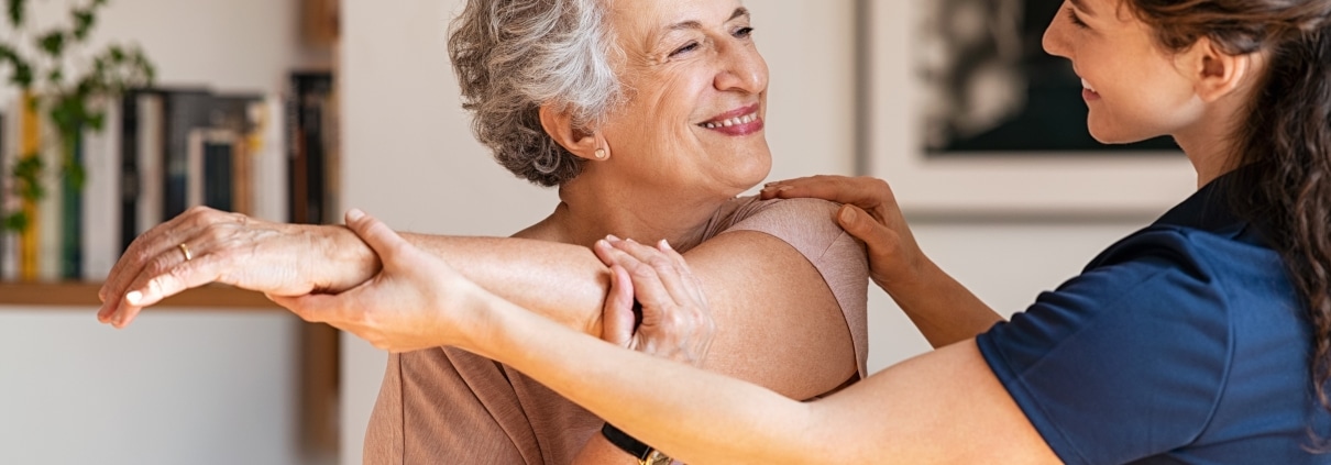 Physical Therapist Assistant with an elderly patient