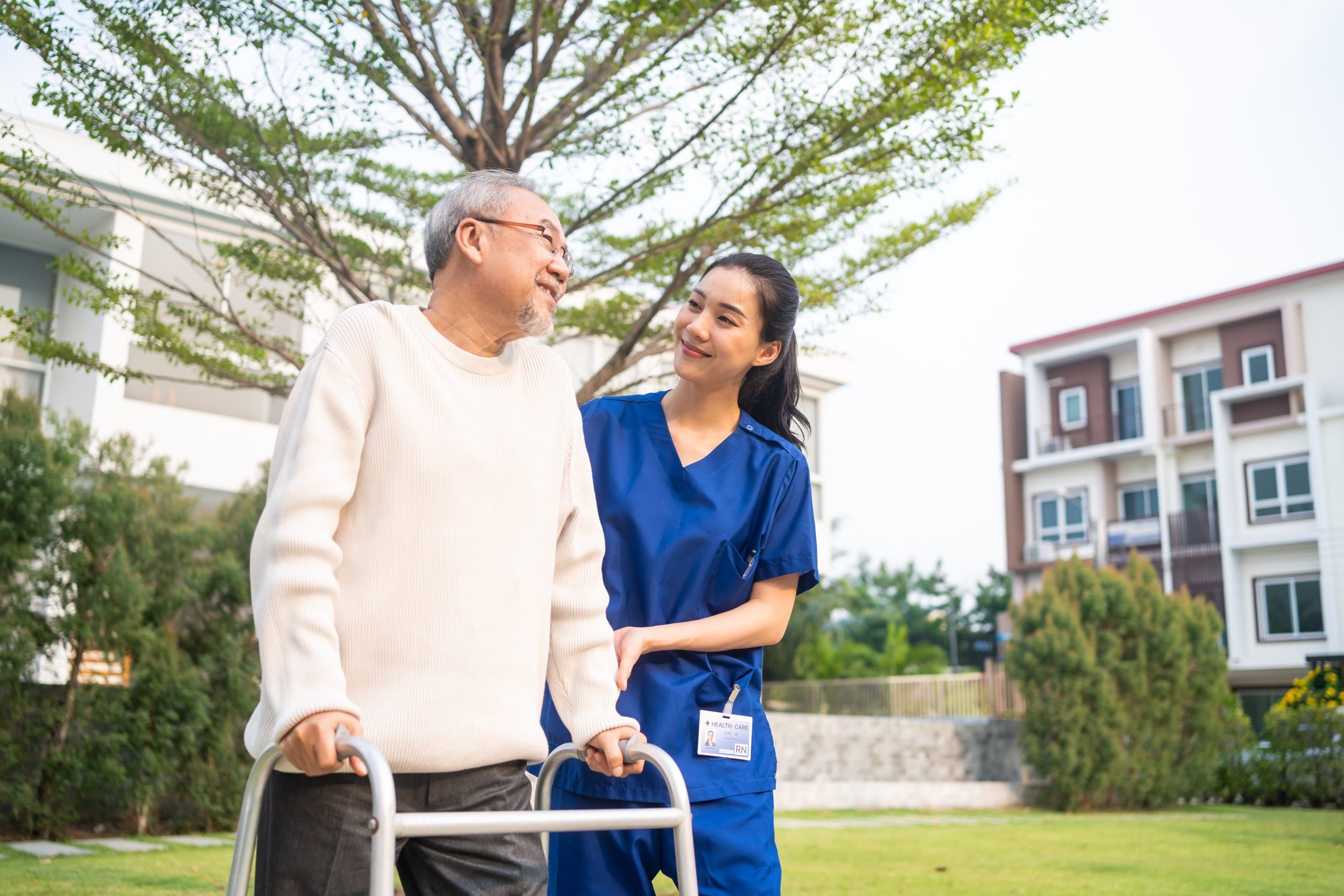 Physical Therapist Assistant outside with a patient