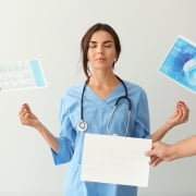 Female nurse meditating and staying calm