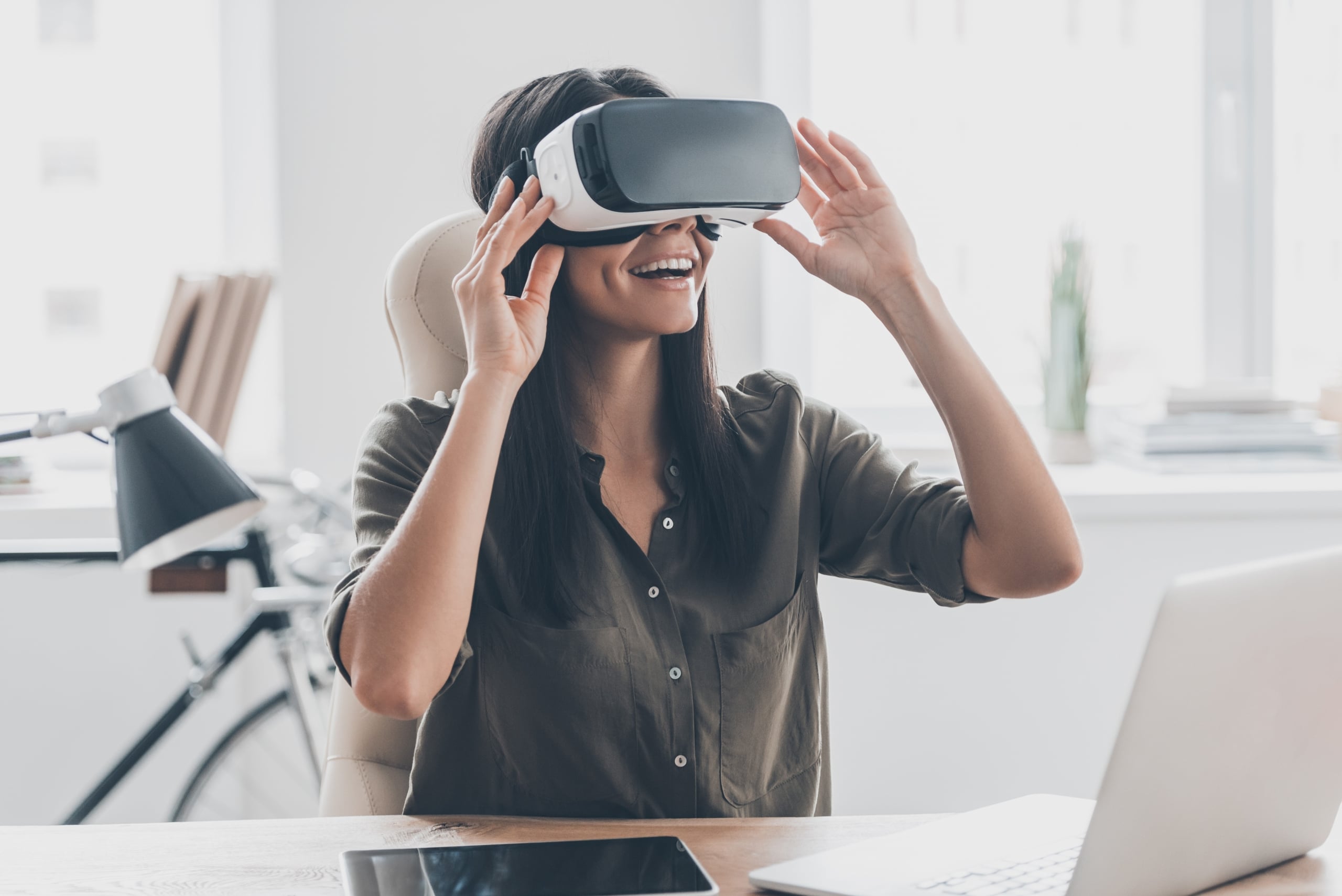Young woman wearing a virtual reality headset