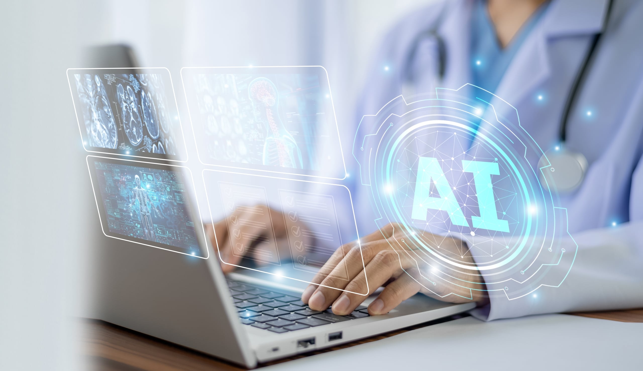 Close up of a medical professional using AI technology on a laptop